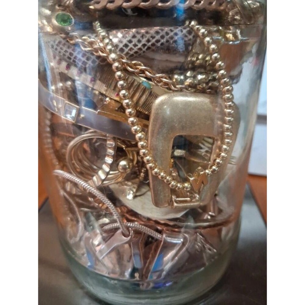Gold tone mystery jar
